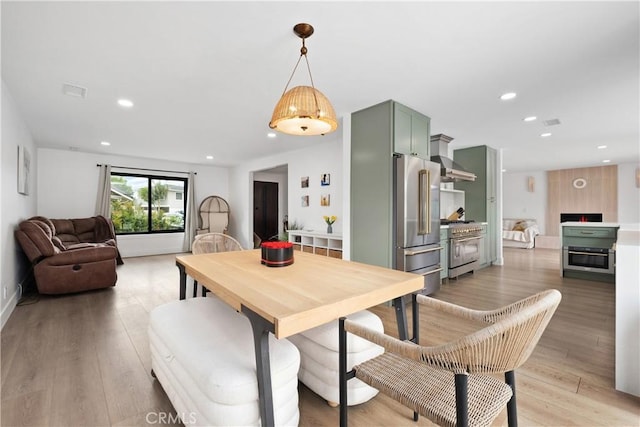 3550 Goldenrod Cir, Seal Beach, CA 90740 - dining room featuring recessed lighting and light wood-type flooring
