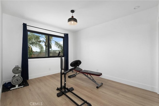 3550 Goldenrod Cir, Seal Beach, CA 90740 - workout area with light wood finished floors and baseboards