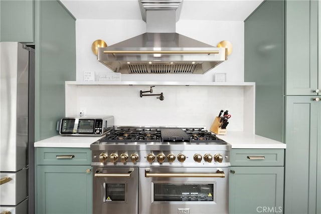 3550 Goldenrod Cir, Seal Beach, CA 90740 - kitchen featuring stainless steel appliances, wall chimney range hood, green cabinets, and open shelves
