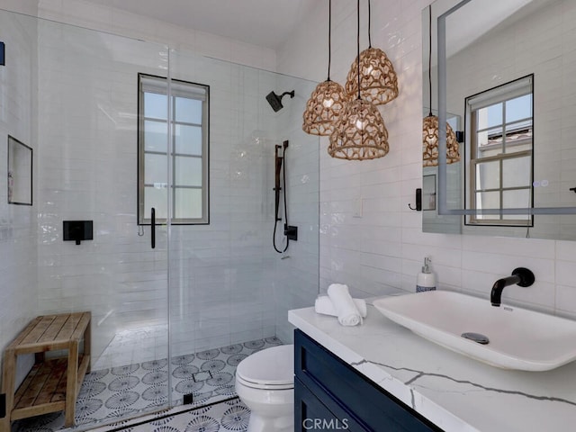 1 Lennox Ct, Ladera Ranch, CA 92694 - bathroom featuring tile walls, vanity, a stall shower, toilet, and tile patterned floors