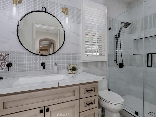 1 Lennox Ct, Ladera Ranch, CA 92694 - full bath featuring tile walls, a shower stall, vanity, and toilet