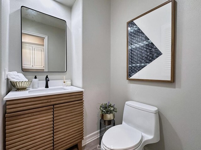 1 Lennox Ct, Ladera Ranch, CA 92694 - half bathroom featuring vanity and toilet