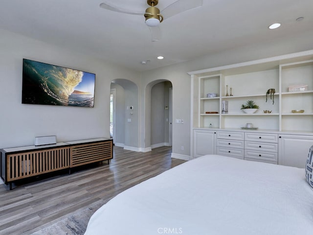 1 Lennox Ct, Ladera Ranch, CA 92694 - bedroom with arched walkways, wood finished floors, recessed lighting, baseboards, and a ceiling fan