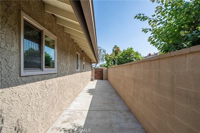 427 W Northridge Ave, Glendora, CA 91741 - view of side of property featuring stucco siding and a gate