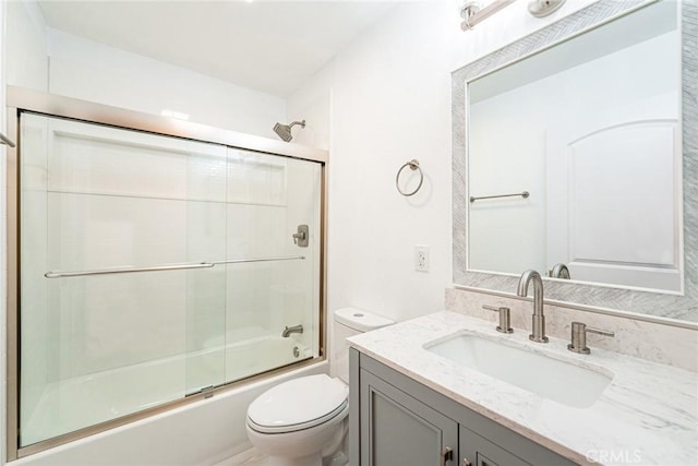 611 W 1st St Unit 101, Santa Ana, CA 92701 - full bath with toilet, vanity, and enclosed tub / shower combo