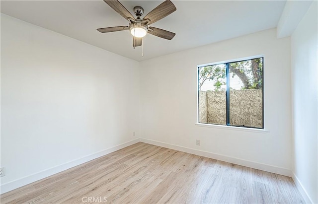 611 W 1st St Unit 101, Santa Ana, CA 92701 - empty room featuring light wood-type flooring, baseboards, and ceiling fan