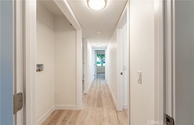 611 W 1st St Unit 101, Santa Ana, CA 92701 - corridor with light wood-style flooring and baseboards