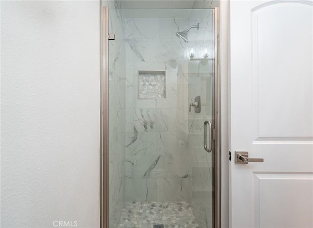 611 W 1st St Unit 101, Santa Ana, CA 92701 - bathroom with a marble finish shower