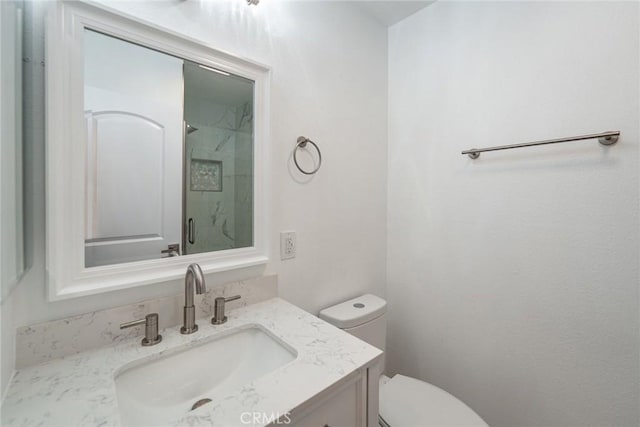 611 W 1st St Unit 101, Santa Ana, CA 92701 - full bathroom with toilet, vanity, and a shower