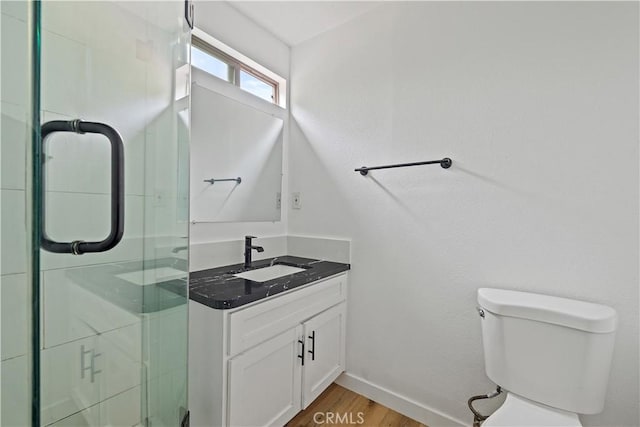 10931 S Burl Ave, Inglewood, CA 90304 - bathroom with vanity, a shower stall, and wood finished floors