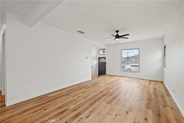 10931 S Burl Ave, Inglewood, CA 90304 - unfurnished living room featuring light wood-style floors and ceiling fan