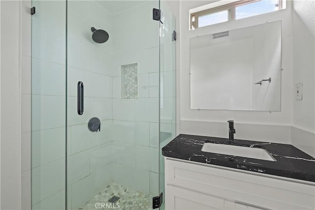 10931 S Burl Ave, Inglewood, CA 90304 - bathroom featuring a shower stall and vanity