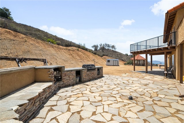 20605 Broadview Dr, Perris, CA 92570 - view of patio with a deck with mountain view