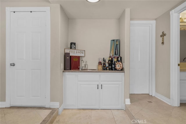 20605 Broadview Dr, Perris, CA 92570 - indoor wet bar with baseboards and light tile patterned flooring