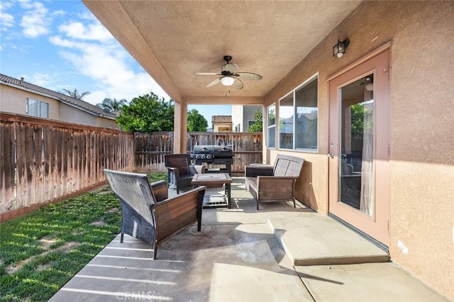 3762 Almansa Way, Perris, CA 92571 - fenced backyard with outdoor lounge area, a patio area, a ceiling fan, and a grill
