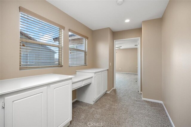 3762 Almansa Way, Perris, CA 92571 - corridor featuring light colored carpet, baseboards, an office area, and recessed lighting