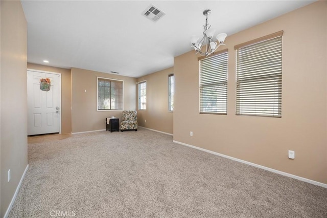 3762 Almansa Way, Perris, CA 92571 - empty room with a chandelier, light colored carpet, baseboards, and recessed lighting
