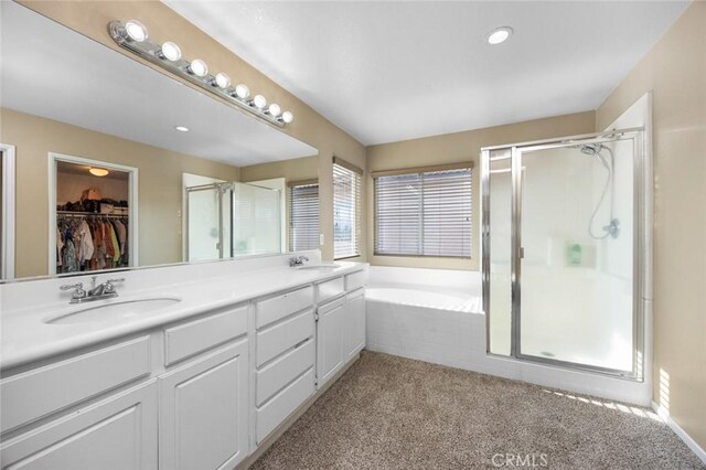 3762 Almansa Way, Perris, CA 92571 - bathroom featuring a shower stall, a bath, double vanity, and recessed lighting