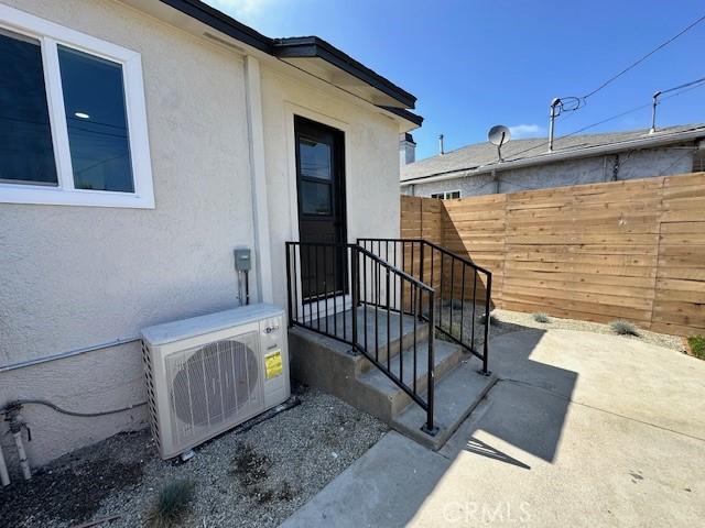 2510 Termino Ave, Long Beach, CA 90815 - entrance to property featuring stucco siding and a patio area