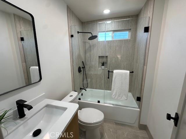 2510 Termino Ave, Long Beach, CA 90815 - bathroom featuring vanity and bath / shower combo with glass door
