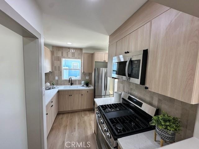2510 Termino Ave, Long Beach, CA 90815 - kitchen featuring stainless steel appliances, light brown cabinets, and light countertops
