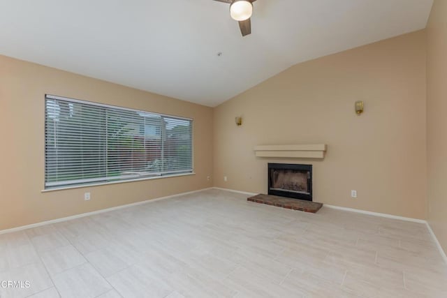 1724 Hilaria St, Oxnard, CA 93030 - unfurnished living room featuring a brick fireplace, a ceiling fan, lofted ceiling, and baseboards