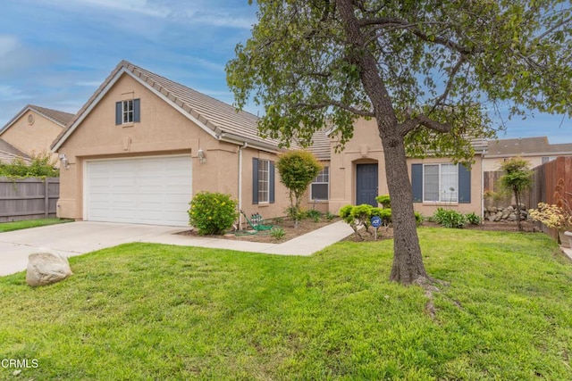 1724 Hilaria St, Oxnard, CA 93030 - traditional home with driveway, stucco siding, and a garage
