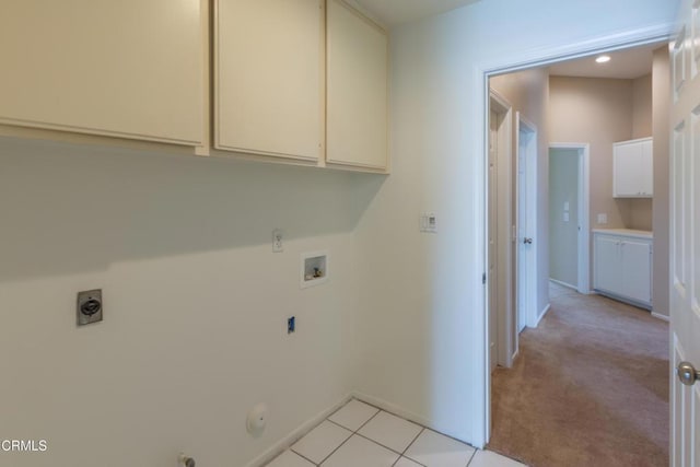 1724 Hilaria St, Oxnard, CA 93030 - laundry room featuring hookup for a gas dryer, cabinet space, washer hookup, hookup for an electric dryer, and baseboards