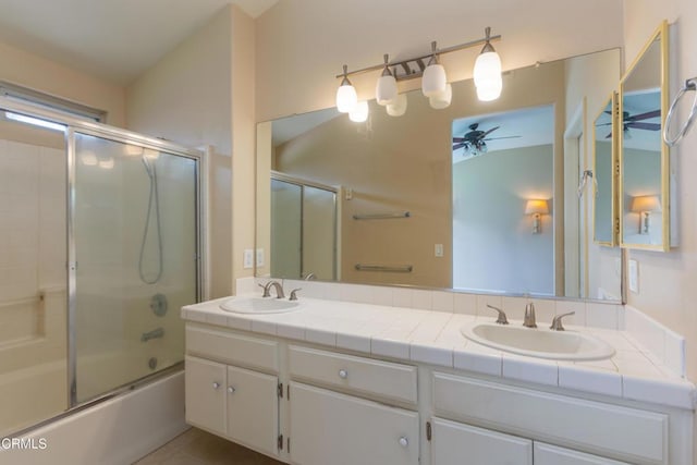 1724 Hilaria St, Oxnard, CA 93030 - bathroom featuring a ceiling fan, double vanity, and enclosed tub / shower combo
