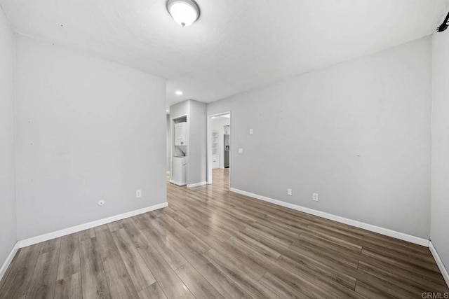 2920 Briarwood Rd Unit G12, Bonita, CA 91902 - spare room with baseboards, wood finished floors, and recessed lighting