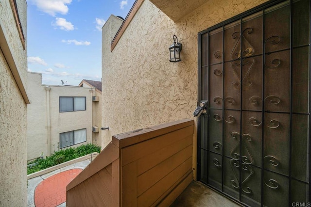 2920 Briarwood Rd Unit G12, Bonita, CA 91902 - view of exterior entry with stucco siding