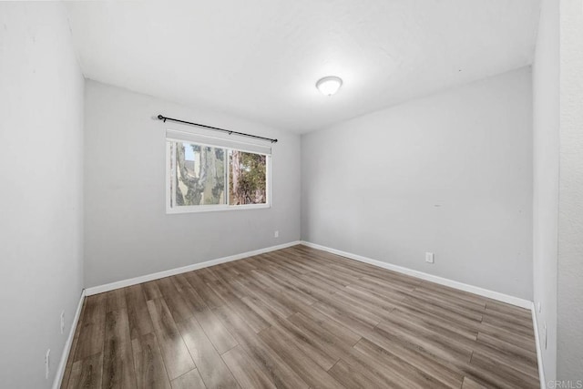 2920 Briarwood Rd Unit G12, Bonita, CA 91902 - empty room featuring wood finished floors and baseboards