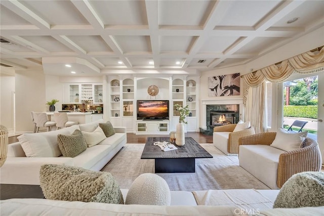 1768 Oakwood Ave, Arcadia, CA 91006 - living room with coffered ceiling, a high end fireplace, built in shelves, beam ceiling, and wood finished floors