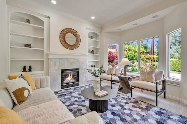 1768 Oakwood Ave, Arcadia, CA 91006 - carpeted living room with built in features, plenty of natural light, a premium fireplace, baseboards, and crown molding