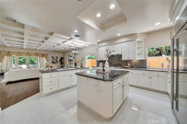 1768 Oakwood Ave, Arcadia, CA 91006 - kitchen with a center island, open shelves, a sink, backsplash, and crown molding
