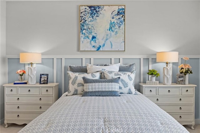 13897 Mesa View Dr, Victorville, CA 92392 - bedroom featuring a decorative wall, a wainscoted wall, and carpet floors