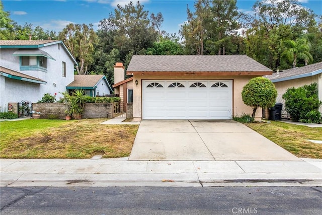 366 Elderberry St, La Verne, CA 91750 - view of front of home featuring concrete driveway, stucco siding, and a garage