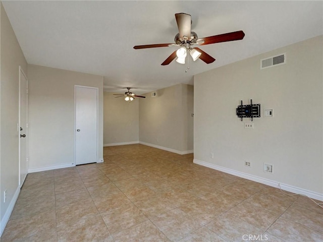 8990 19th St Unit 426, Rancho Cucamonga, CA 91701 - empty room with a ceiling fan, light tile patterned flooring, and baseboards