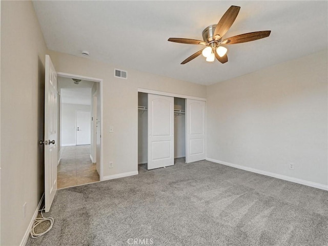 8990 19th St Unit 426, Rancho Cucamonga, CA 91701 - unfurnished bedroom with carpet flooring, a closet, baseboards, and a ceiling fan