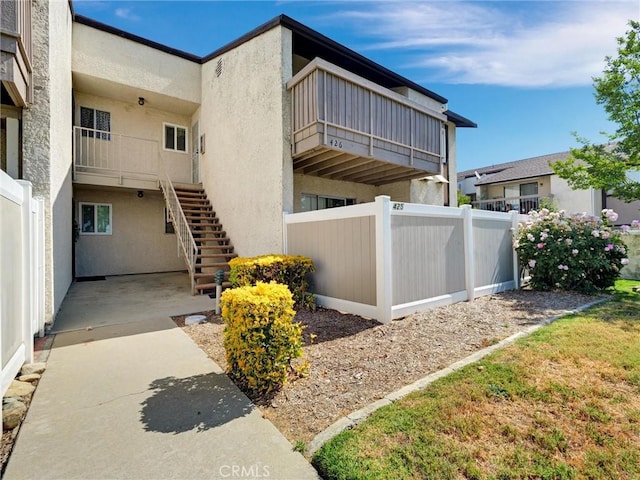 8990 19th St Unit 426, Rancho Cucamonga, CA 91701 - view of property featuring stairway
