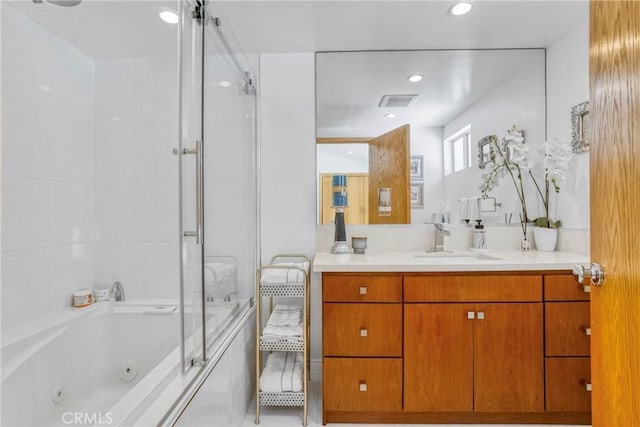 3839 Davana Rd, Sherman Oaks, CA 91423 - bathroom with vanity, a combined bath / shower with jetted tub, and recessed lighting