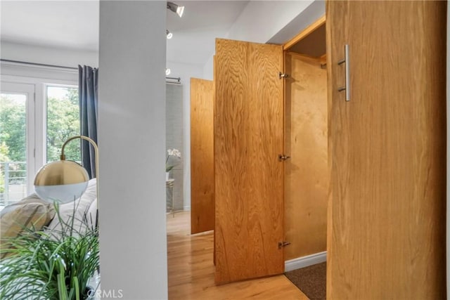 3839 Davana Rd, Sherman Oaks, CA 91423 - corridor featuring wood finished floors