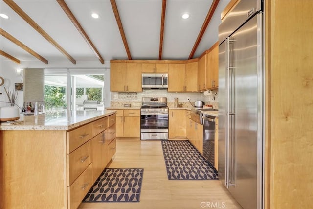 3839 Davana Rd, Sherman Oaks, CA 91423 - kitchen featuring stainless steel appliances, light wood finished floors, light brown cabinets, decorative backsplash, and recessed lighting