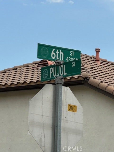 28450 6th St, Temecula, CA 92590 - exterior view of a tile roof and stucco siding