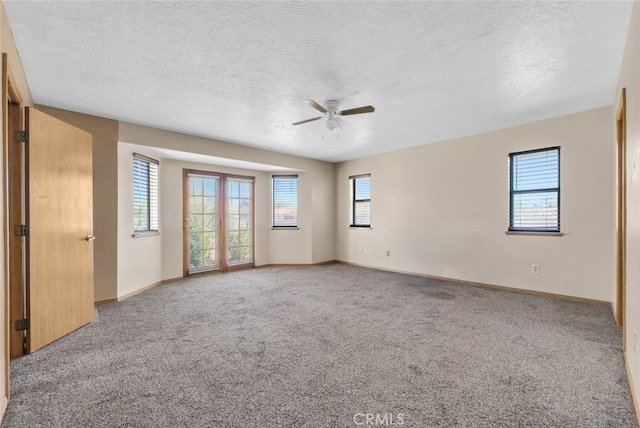 16635 Wintun Rd, Apple Valley, CA 92307 - empty room featuring a ceiling fan, carpet, baseboards, and a textured ceiling