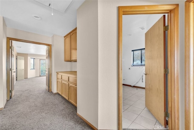 16635 Wintun Rd, Apple Valley, CA 92307 - hallway featuring healthy amount of natural light, attic access, and baseboards