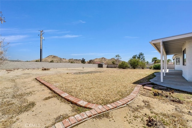 16635 Wintun Rd, Apple Valley, CA 92307 - view of yard with a patio and a mountain view