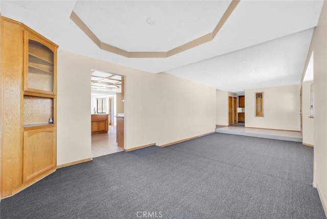 16635 Wintun Rd, Apple Valley, CA 92307 - spare room featuring carpet floors, baseboards, and a tray ceiling