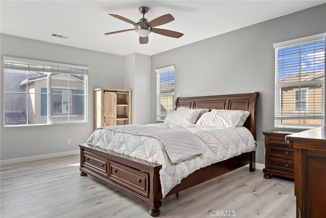 341 W Pebble Creek Ln, Orange, CA 92865 - bedroom featuring light wood-style flooring, baseboards, and a ceiling fan