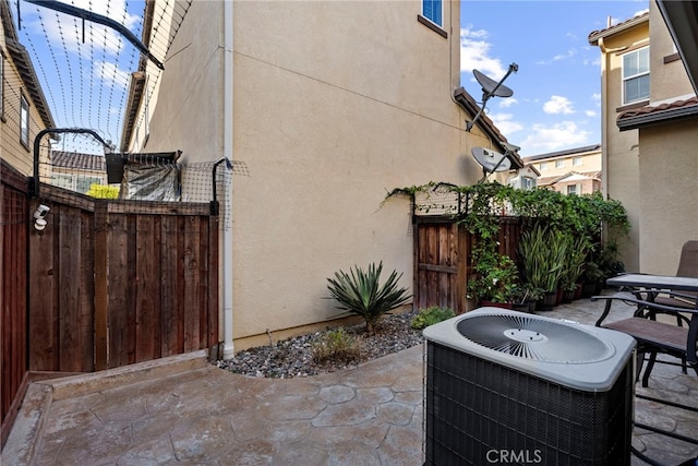 341 W Pebble Creek Ln, Orange, CA 92865 - view of patio with cooling unit and outdoor dining area